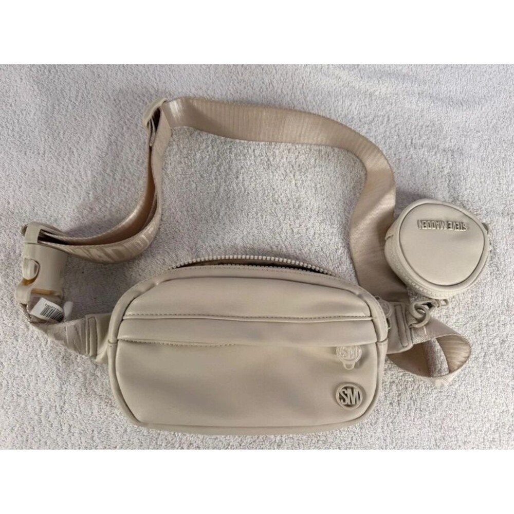 Overview        The item shown iSteve Madden Faux-Leather Oval Belt Bag